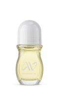 Auravlla FROST fragrance oil in a clear glass roll-on bottle with a white cap and pale yellow liquid perfume.